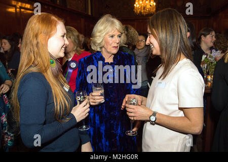 The Duchess of Cornwall meets Sunday Times royal correspondent Roya Nikkhah (right) and Daily Telegraph royal correspondent Hannah Furness (left) during a reception for Women in Journalism at The Ned in London. Stock Photo