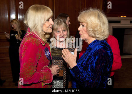 The Duchess of Cornwall meets Lynn Faulds Wood (left) during a reception for Women in Journalism at The Ned in London. Stock Photo