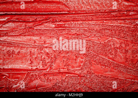 Red bumpy wall stucco texture background, crumpled leather imitation Stock Photo