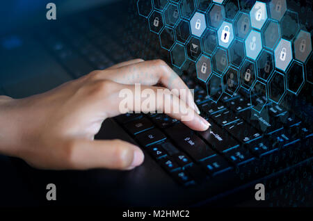 Press enter button on the computer. Key lock security system abstract technology world digital link cyber security on hi tech Dark blue background, En Stock Photo