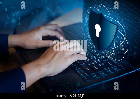 Press enter button on the keyboard computer Shield cyber Key lock security system abstract technology world digital link cyber security on hi tech Dar Stock Photo