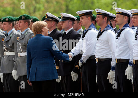 Federal Chancellor Angela Merkel welcomes in Berlin with military honors the President of the Republic of Niger, Mahamadou Issoufou. Stock Photo