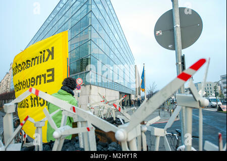Some Greenpeace activist demonstrated their discontent to the renewable energy policy on the day that the SPD and CDU / CSU are in a meeting to define the future of the coalition. Stock Photo