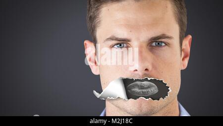 Man with torn paper on mouth and lips negative Stock Photo