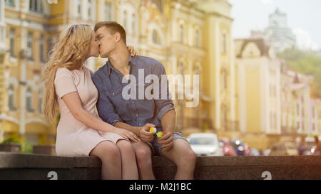 Young man and woman kissing on sweet romantic date, happiness and love, couple, stock video Stock Photo