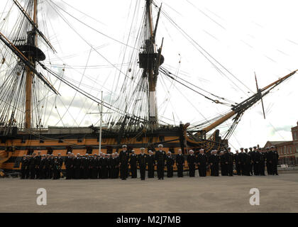 100607-N-1092P-089 (Portsmouth, U.K.) Sailors assigned to the Arleigh Burke-class destroyer USS Winston S. Churchill, stand in formation in front of the HMS Victory, the oldest commissioned warship in the world, before boarding for a frocking ceremony Monday, June 7, 2010. Churchill deployed as part of the Harry S. Truman Carrier Strike Group (HST CSG) in support of Maritime Security Operations (MSO) and Theater Security Cooperation (TSC) efforts in the U.S. 5th and 6th Fleet areas of responsibility. HST CSG includes Commander, Carrier Strike Group (CCSG) 10 staff, USS Harry S. Truman (CVN 75) Stock Photo