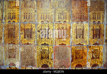 Mediaeval tiles in a wall in Malvern Priory, Worcestershire, England. The Priory is the parish church of St Mary and St Michael, Great Malvern. Stock Photo
