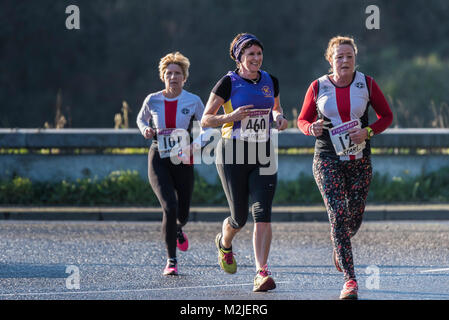 Mature runners competing in a road race in Newquay Cornwall. Stock Photo