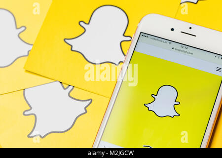 OXFORD, UK - JANUARY 9th 2017: An apple iPhone showing the Snapchat application alongside other Snapchat logos. Snapchat is a popular social media application for sharing messages, images and videos Stock Photo