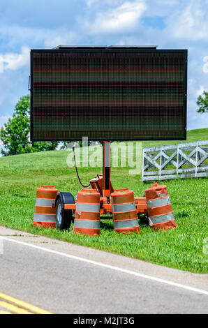 Vertical shot of a blank roadside electronic traffic control sign. Stock Photo