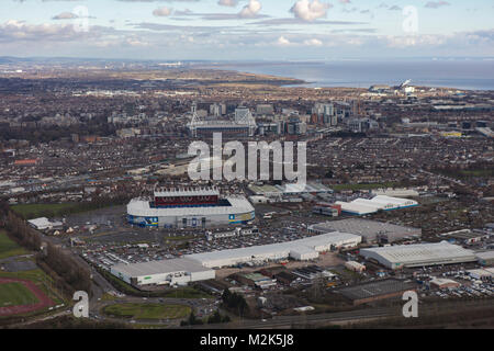 An aerial view of the skyline of the Welsh Capital Cardiff with the Bristol Channel visible beyond Stock Photo