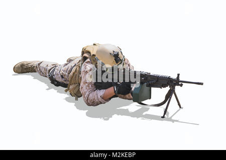 military army soldier lies prone on a firing Machine Gun M249 isolated on white Stock Photo