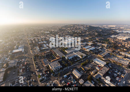 Long Beach, California, USA - January 11, 2018:  Foggy afternoon aerial view of buildings and streets near Signal Hill. Stock Photo