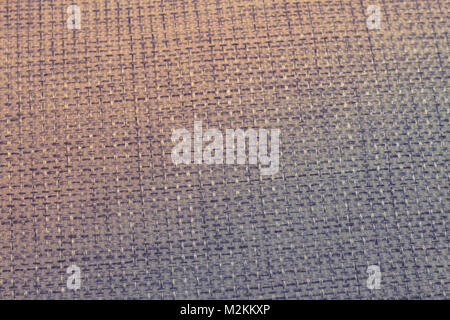 Texture by discoloured gray woven fabric, with lights. Stock Photo