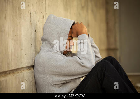 African American young teen feeling depressed. Stock Photo