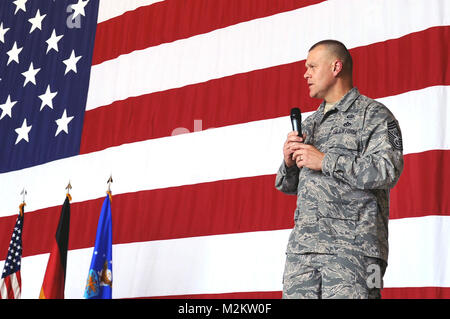 Chief Master Sgt. of the Air Force James A. Roy speaks to Airmen during an enlisted call, Ramstein Air Base, Germany, July 7, 2010. The purpose of Chief Roy's visit is to meet Airmen in Germany and Italy. Chief Roy visited several squadrons on Ramstein to include: 603rd Air Operations Center, 435th Contingency Response Group, and Landstuhl Regional Medical Center. (U.S. Air Force photo by Airman 1st Class Grovert Fuentes-Contreras)(Released) Chief Master Sgt. of th Air Force talks with Ramstein airmen by EUCOM Stock Photo