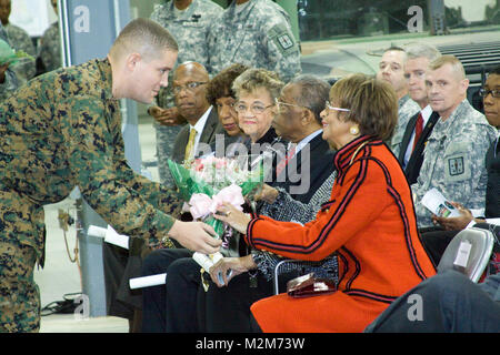 Joyce Rozier, wife of the late Maj. Gen. Jackson E. Rozier, Jr., attends the Tactical Support Equipment Department ribbon cutting and building dedication ceremony on Nov. 20, 2009. The new facility is named Rozier Hall after Maj. Gen. Rozier who served as an Army ordnance officer, and at one point in time in his career was the Commanding General/Commandant of the U.S. Army Ordnance Center and School.  (Official Army Photo By Patrick Bloodgood) 091120-A-5177B-006 by norfolkdistrict Stock Photo