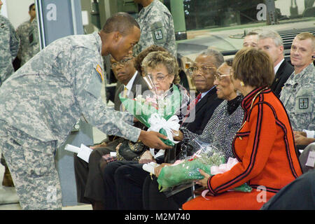 Joyce Rozier, wife of the late Maj. Gen. Jackson E. Rozier, Jr., attends the Tactical Support Equipment Department ribbon cutting and building dedication ceremony on Nov. 20, 2009. The new facility is named Rozier Hall after Maj. Gen. Rozier who served as an Army ordnance officer, and at one point in time in his career was the Commanding General/Commandant of the U.S. Army Ordnance Center and School.  (Official Army Photo By Patrick Bloodgood) 091120-A-5177B-008 by norfolkdistrict Stock Photo