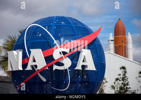 Nasa sign and space shuttle exhibit at the entrance to the Kennedy Space Centre, Florida, USA Stock Photo