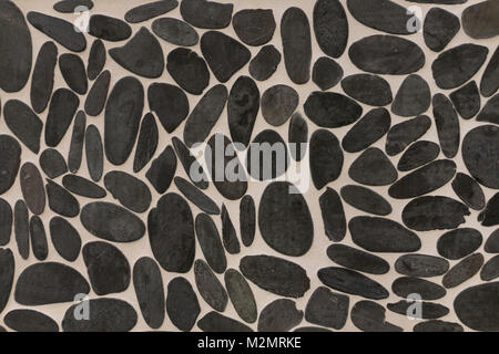 stone structured mosaic on a wall Stock Photo