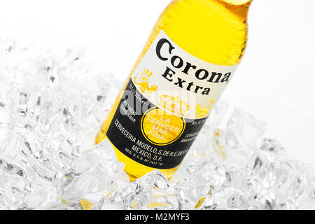 Trieste, Italy - June 23, 2016: Corona Extra is one of the top-selling beers worldwide is a pale lager produced by Cerveceria Modelo in Mexico. Stock Photo