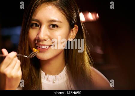 Young women eat in restaurants Stock Photo