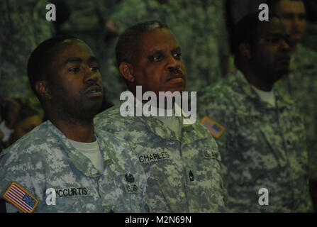 JEANERETTE, La. - Soldiers of the Louisiana Army National Guard's E Company, 199th Brigade Support Battalion, of the 256th Infantry Brigade Combat Team, bid farewell to family and friends at a deployment ceremony at Jeanerette High School in Jeanerette, La., Jan. 7.  (U.S. Army Photo by Sgt. Michael L. Owens, Louisiana National Guard State Unit Public Affairs Representative) 100107-A-0635O-100 by Louisiana National Guard Stock Photo