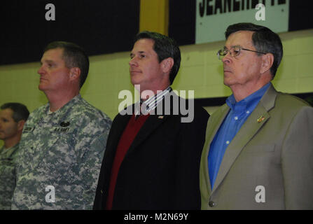 JEANERETTE, La. - Soldiers of the Louisiana Army National Guard's E Company, 199th Brigade Support Battalion, of the 256th Infantry Brigade Combat Team, bid farewell to family and friends at a deployment ceremony at Jeanerette High School in Jeanerette, La., Jan. 7.  (U.S. Army Photo by Sgt. Michael L. Owens, Louisiana National Guard State Unit Public Affairs Representative) 100107-A-0635O-102 by Louisiana National Guard Stock Photo