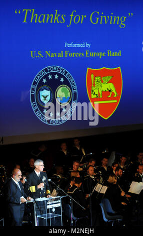 101119-N-7280V-075: NAPLES, Italy (Nov. 19, 2010) Commander, U.S. Naval Forces Europe-Africa (CNE-CNA) Adm. Samuel J. Locklear, III, speaks to more than 420 military and civilian guests at the “Thanks for Giving” concert at Mostra D'Oltremare Teatro in Naples. The concert was performed by CNE Band to show CNE-CNA’s appreciation to the local Italian civic community, NATO allies and the many charitable and family volunteer organizations who have dedicated their support to the U.S. community. (U.S. Navy photo by Mass Communication Specialist 2nd Class Daniel Viramontes/Released) Thanks for Giving Stock Photo