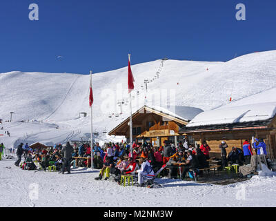 Winter scenes in the snowsports resort of Zinal in the Valais canton of Switzerland and showing the Marmotte Cafe on the slopes at Sorebois. Stock Photo