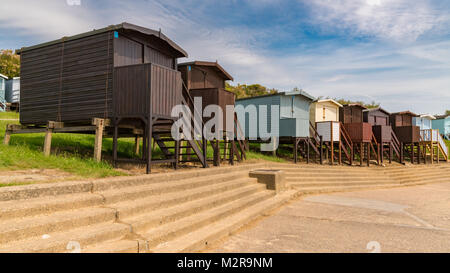 Beach huts at the promenade, seen in Walton-on-the-Naze, Essex, England, UK Stock Photo