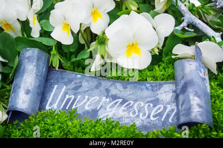 Grave decoration, 'unvergessen' (unforgotten) Stock Photo
