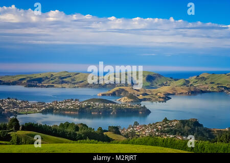 Dunedin town and bay as seen from the hills above, South Island, New Zealand Stock Photo