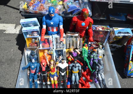 a box of american superhero dolls in brooklyn flea market new york USA Stock Photo