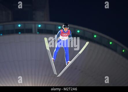 Pyeongchang, South Korea. 8th February, 2018. One of the test jumpers. Mens normal hill individual. Qualification. Ski jumping. Alpensia ski jump centre. Pyeongchang2018 winter Olympics. Alpensia. Pyeongchang. Republic of Korea. 08/02/2018. Credit: Sport In Pictures/Alamy Live News Stock Photo