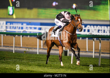 Dubai, UAE. 8th Feb 2018. Oisin Murphy rides Hit the Bid (GB) to victory in the Watch Time race at Meydan. My Catch is trained by Darren Bunyan and owned by Straight To Victory Syndicate Credit: Feroz Khan/Alamy Live News Stock Photo