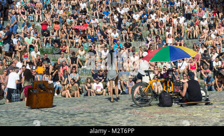 BERLIN, GERMANY - June 11, 2017: People singing to a crowd in the sunday karaoke day in Mauerpark Stock Photo
