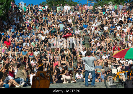 BERLIN, GERMANY - June 11, 2017: Man singing to a crowd in the sunday karaoke day in Mauerpark Stock Photo