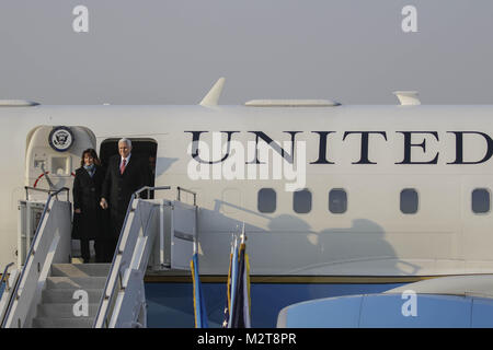 Songtan, Gyeonggi, South Korea. 8th Feb, 2018. Feb 8, 2018-Songtan, South Korea-United States Vice President Mike Pence and Karen Pence arrives at Osan military air base in Songtan, South Korea. Vice President Mike Pence is pushing South Korea to adopt a more hawkish stance toward the North, as he arrived in the country Thursday ahead of the Winter Olympics. Pence met with President Moon Jae-in to advocate a clear-eyed approach toward his bellicose, nuclear-armed neighbor, warning against North Korean ''propaganda'' around the games. Athletes from both Koreas will compete as one team in Stock Photo