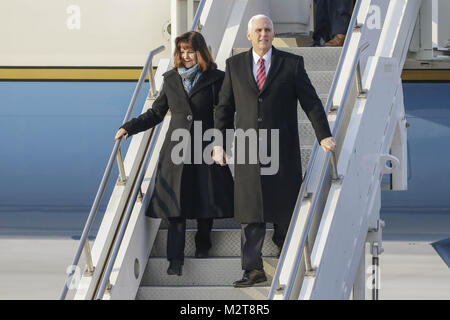 Songtan, Gyeonggi, South Korea. 8th Feb, 2018. Feb 8, 2018-Songtan, South Korea-United States Vice President Mike Pence and Karen Pence arrives at Osan military air base in Songtan, South Korea. Vice President Mike Pence is pushing South Korea to adopt a more hawkish stance toward the North, as he arrived in the country Thursday ahead of the Winter Olympics. Pence met with President Moon Jae-in to advocate a clear-eyed approach toward his bellicose, nuclear-armed neighbor, warning against North Korean ''propaganda'' around the games. Athletes from both Koreas will compete as one team in Stock Photo