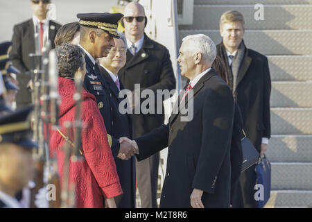 Songtan, Gyeonggi, South Korea. 8th Feb, 2018. Feb 8, 2018-Songtan, South Korea-United States Vice President Mike Pence and Vincent Brooks USFK Commander shakes hands after arrives at Osan military air base in Songtan, South Korea. Vice President Mike Pence is pushing South Korea to adopt a more hawkish stance toward the North, as he arrived in the country Thursday ahead of the Winter Olympics. Pence met with President Moon Jae-in to advocate a clear-eyed approach toward his bellicose, nuclear-armed neighbor, warning against North Korean ''propaganda'' around the games. Athletes from bot Stock Photo