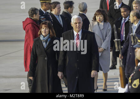 Songtan, Gyeonggi, South Korea. 8th Feb, 2018. Feb 8, 2018-Songtan, South Korea-United States Vice President Mike Pence and Karen Pence arrives at Osan military air base in Songtan, South Korea. Vice President Mike Pence is pushing South Korea to adopt a more hawkish stance toward the North, as he arrived in the country Thursday ahead of the Winter Olympics. Pence met with President Moon Jae-in to advocate a clear-eyed approach toward his bellicose, nuclear-armed neighbor, warning against North Korean ''propaganda'' around the games. Athletes from both Koreas will compete as one team in Stock Photo