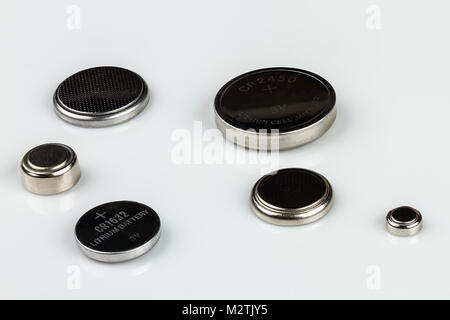 set of lithium button cell batteries on white background Stock Photo