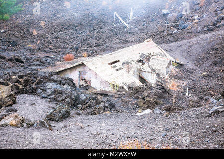 House buried under lava on southern flank of Mount Etna volcano, Sicily