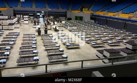 In 2017, the Strategic National Stockpile (SNS) simultaneously responded to not one, but three consecutive hurricanes, and at the direction of U.S. Department of Health and Human Services (HHS), rapidly deployed expert personnel, Federal Medical Stations (FMS), and other supplies to the affected areas. The first FMS and staff arrived in Puerto Rico within 48 hours of receiving orders from HHS. Six FMS were shipped to Puerto Rico. Four were set up in the cities of Manati, Bayamón, Ponce, and Arecibo. . Depicted here, was a completed FMS. Stock Photo