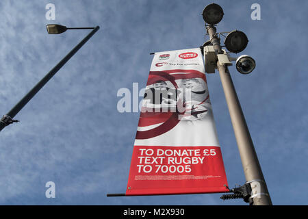 rugby themed try for change sport relief banner adverts outside twickenham stadium, home of the english rugby football union (rfu) Stock Photo