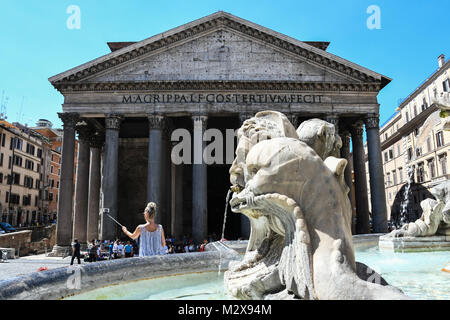 Woman takes selfie outside of Pantheon in Rome Italy Stock Photo