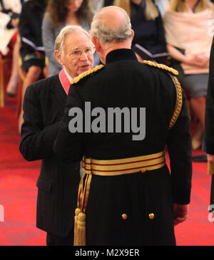 Professor Charles Skene from Aberdeen is made a CBE (Commander of the Order of the British Empire) by the Prince of Wales during an investiture ceremony at Buckingham Palace, London. Stock Photo