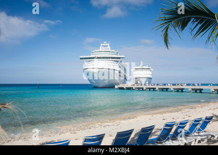 Two cruise ships docked alongside each other in the Catalina Island Caribbean Stock Photo