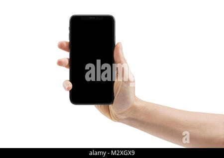Woman hand holding Apple iPhone X, large screen smartphone, with blank black screen. The phone is isolated on white background with a clipping path. Stock Photo